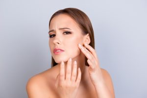 Combating Oily Skin: Causes Of Oily Skin And Solutions