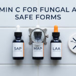 Three vitamin C derivative serum bottles with magnifier and safety indicator on white tile